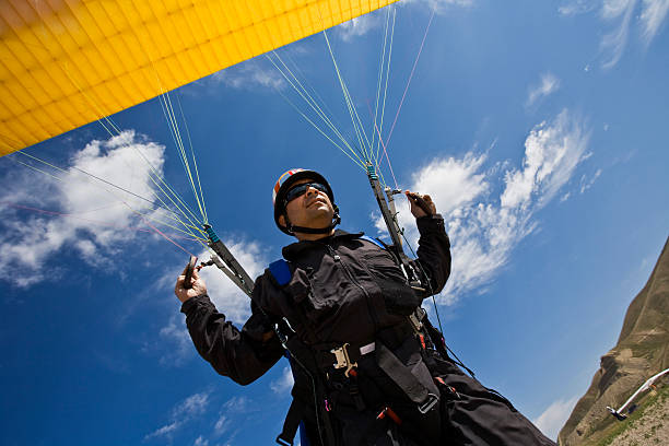 Take-off of a Paraglider stock photo