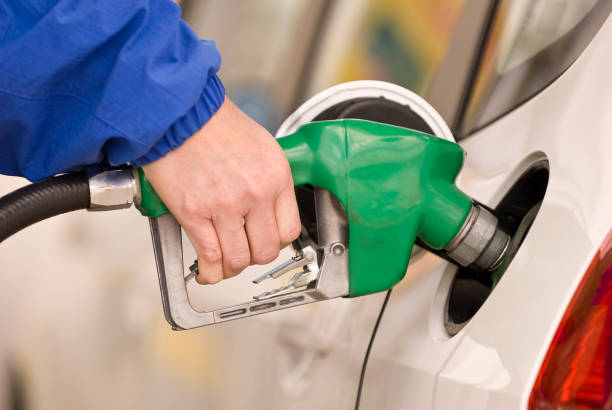 istock Refueling Automobile With Gasoline Pump Nozzle 157332507
