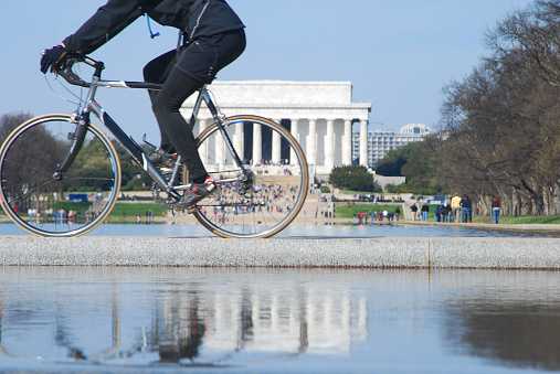 Biker and Lincoln Memorial in reflection