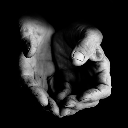 B&W image of hands of a very old farmer in Turkey.