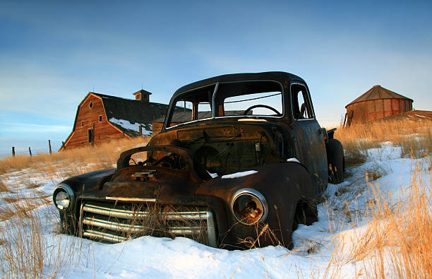 istock Abandoned Farm and Rusty Truck in Winter 157332578