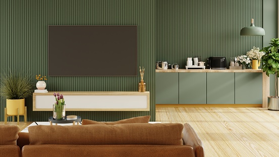 Living room interior wall mockup in dark green room with leather sofa which is behind the kitchen.3d rendering