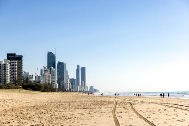 People enjoying sunny day at the beach, background with copy space, Queensland, Gold Coast Broadbeach, full frame horizontal composition