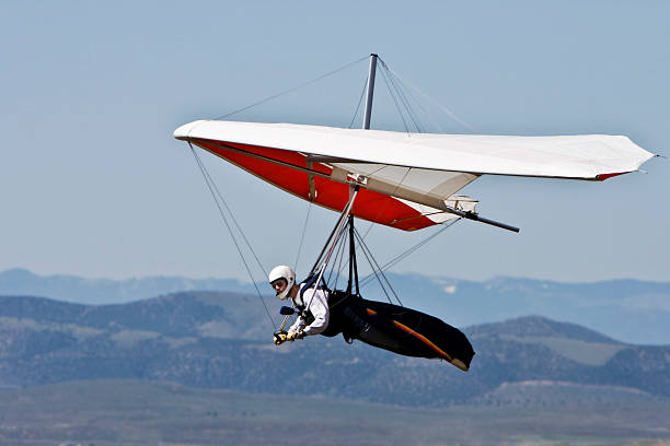 Hang Gliding up High. stock photo