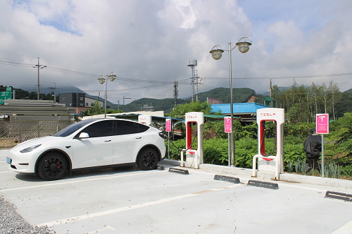 Gapyeong, South Korea-July 27, 2023: Tesla EV charging station in rural, but rapidly gentrifying, Seorak, Gapyeong