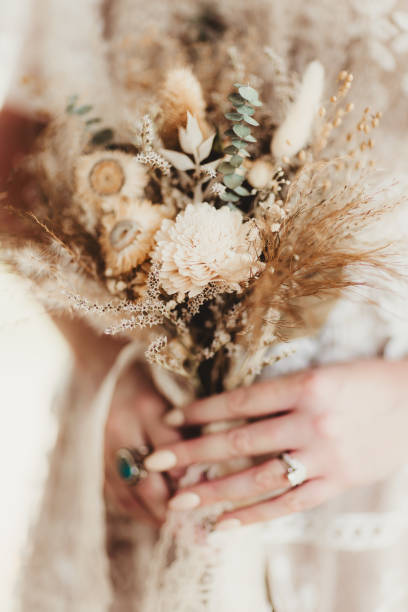 istock Boho wedding bouquet of dried flowers 1573328316