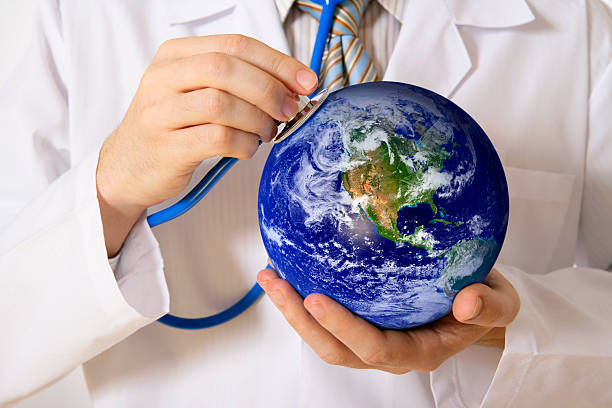 global healthcare - globe earth world map human hand stock-fotos und bilder