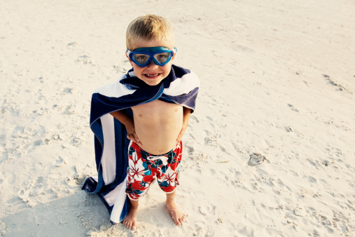 Father and son spending day together on the beach