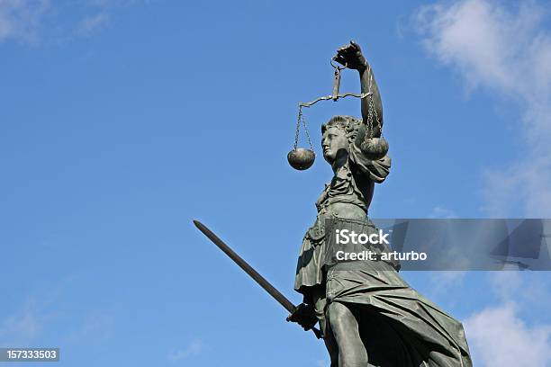 Ancient Justicia Statue With Scale And Sword From Left Stock Photo - Download Image Now