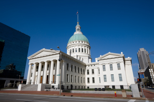 The Indiana Statehouse capitol building with blue sky behind.  Indiana, USA.