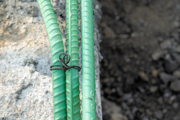 Epoxy coated rebar is used in concrete subjected to corrosive conditions.  These may include exposure to deicing salts or marine environments.