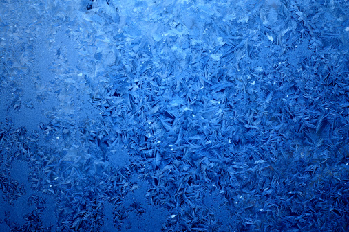 Frosty natural pattern on winter window