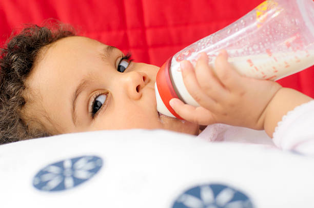 Baby Child drinking milk bottle ( serie)