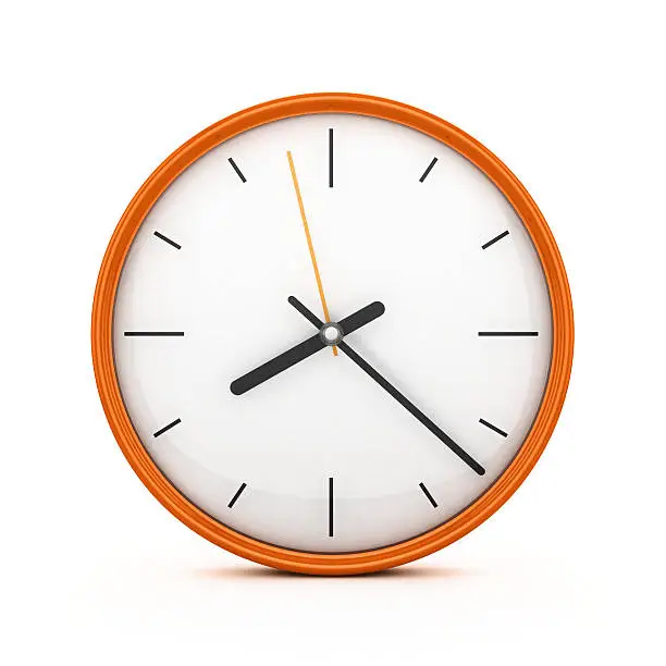 Photo of An orange clock on an isolated white background
