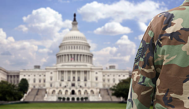 Military soldier in front of U.S. capitol stock photo