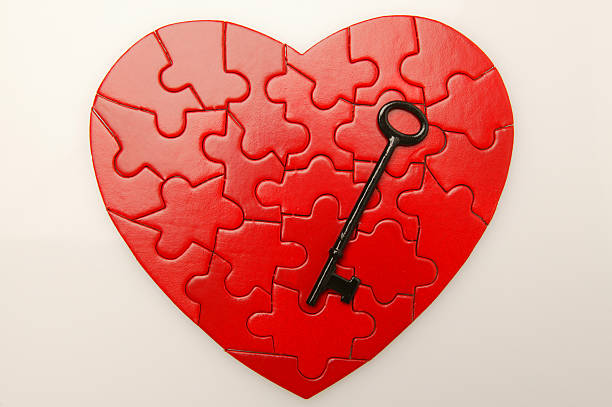 istock heart puzzle with antique key 157334497