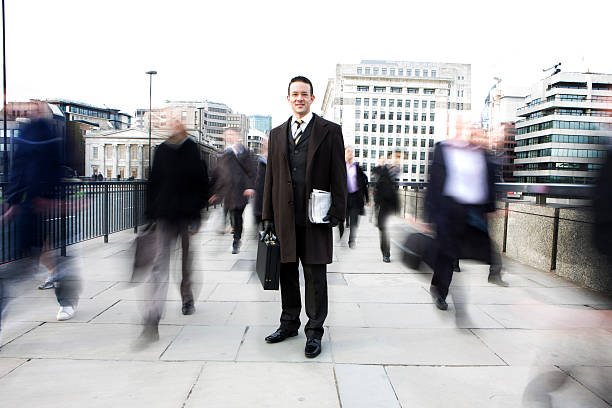 Urban business: a London businessman portrait in a relentless world stock photo