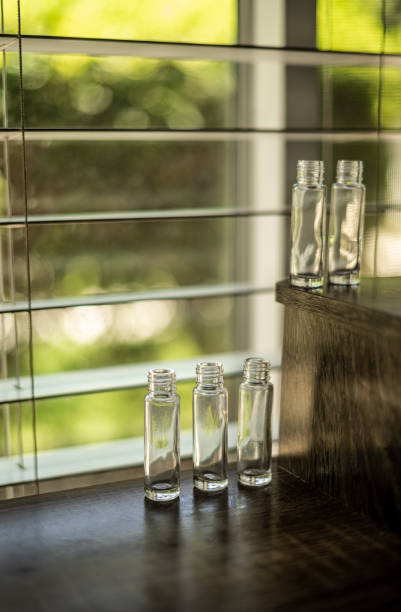 istock 5 pack 2.7 Dram (10 ml) Clear Glass Round Vials 1573347870
