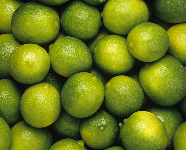 limes - limones verdes fotografías e imágenes de stock