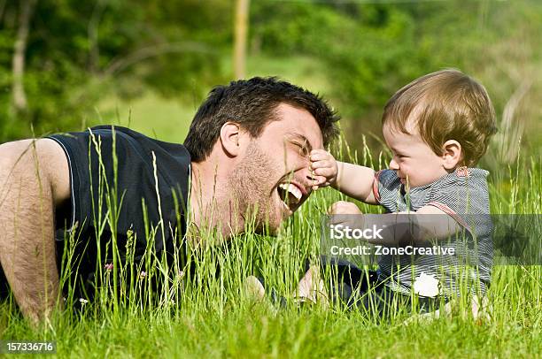 Cute Little Child Joke Outdoor With Dad Stock Photo - Download Image Now - Baby - Human Age, Father, Fun