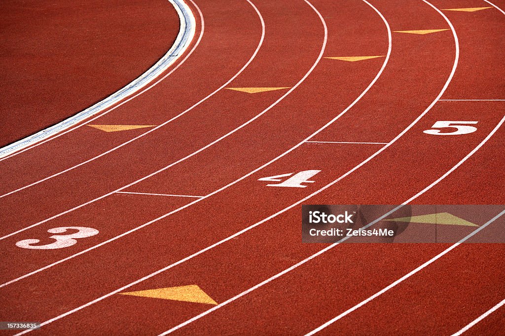 Curving lanes of track  Running Track Stock Photo