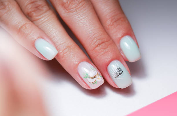 istock A woman's hand after manicure care 1573371853