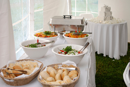 A buffet awaits the wedding guests.  Click to view similar images.