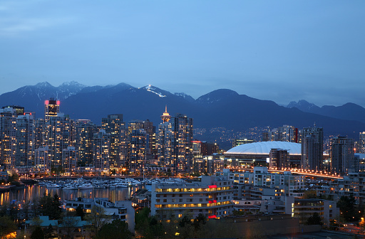 Downtown Vancouver City at night after sunset. Aerial Panorama. BC, Canada.