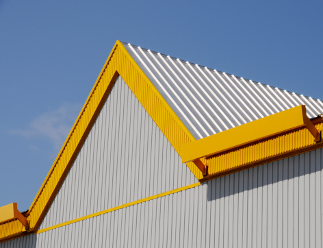 Yellow Roof Peek Building Detail; Don Hutson Center