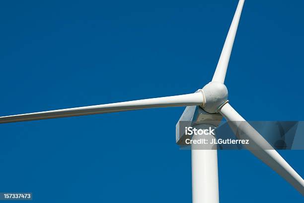 Closeup Of Wind Turbine Against Blue Sky Stock Photo - Download Image Now - Blue, Clear Sky, Color Image