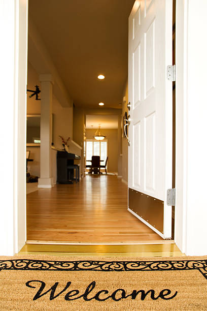 istock A welcome mat with the door open 157338612