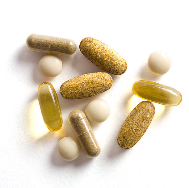 details - lecithin capsule brown vitamin pill stock-fotos und bilder