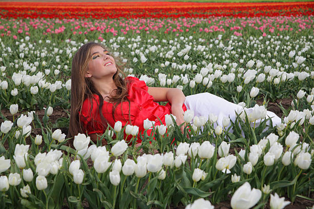An image of a pretty girl with camomiles