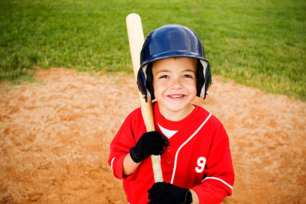 enfants de baseball - batting gloves photos et images de collection