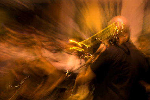Blur motion of a trumpet player in jazz concert