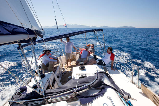 istock Happy sailing crew on sailboat 157339396