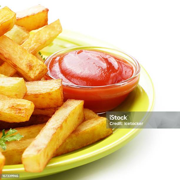 Foto de Batata Frita Com Ketchup e mais fotos de stock de Alimentação Não-saudável - Alimentação Não-saudável, Amarelo, Amontoamento