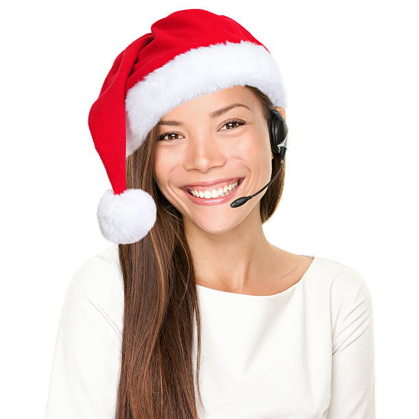 クリスマスのヘッドフォン��の女性 - help support technology it support ストックフォトと画像