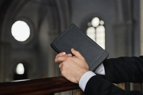 istock Pastor with Bible in church 1573417212