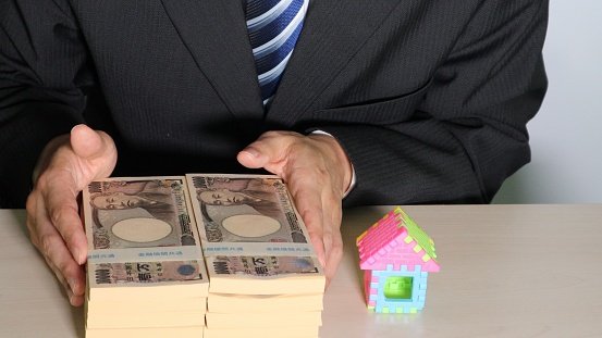 Photo of a businessman buying a house