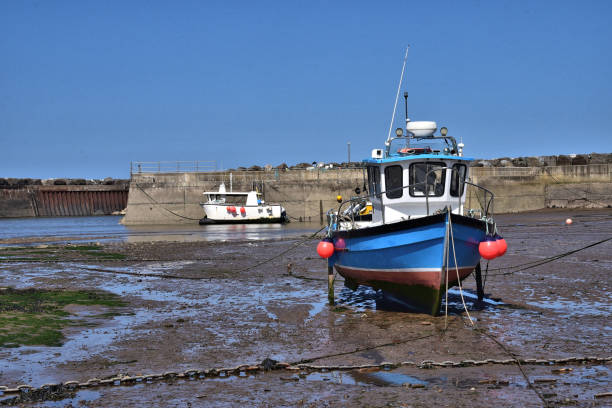 istock The Harbour at Staithes, North Yorkshire, England, UK 1573463641