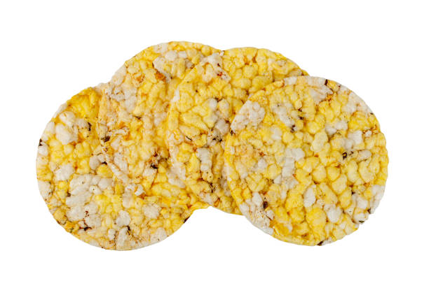 istock Puffed Corn Cake Isolated, Corn Diet Bread with Fragrant Herbs and Spices, Waffle with Corns, Rice, Cereal Snack 1573473074