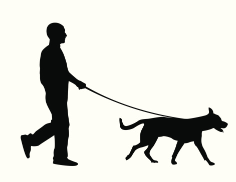 A man walking his dog.