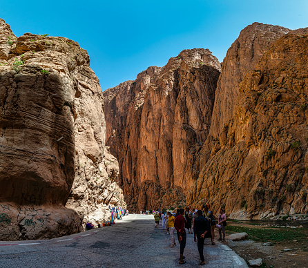 Todra Canyon, Morocco - May 12, 2023: Tourists in the Todra Canyon in Morocco, Africa.