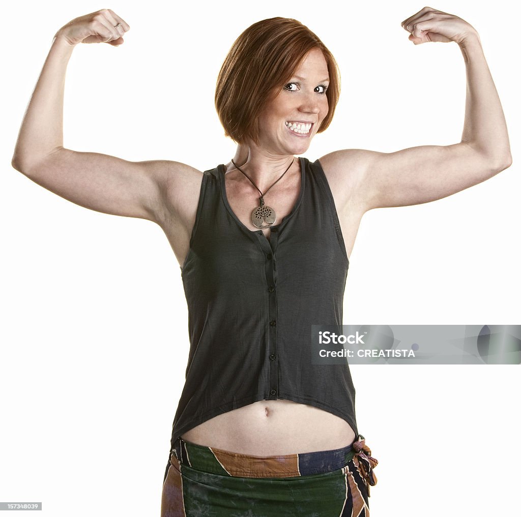 Donna sorridente con i muscoli - Foto stock royalty-free di Beautiful Woman