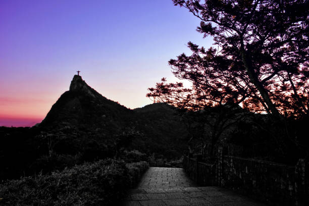 A view to Corcovado Mountain at dusk from the beautiful Mirante Dona Marta in Rio de Janeiro, Brazil.