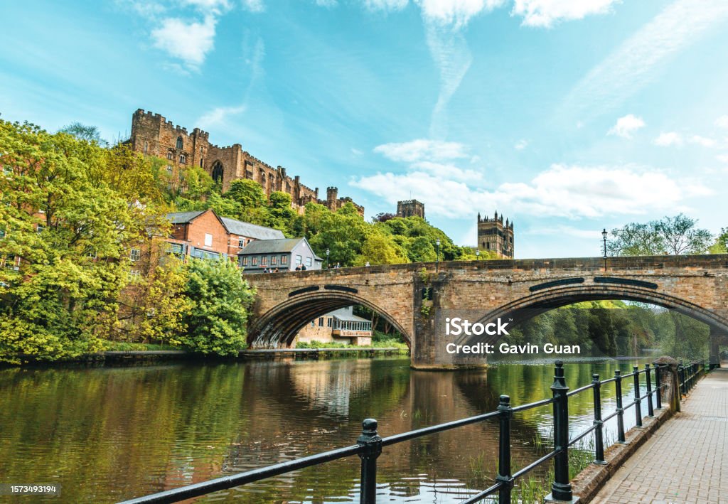 The view of Durham Cathedral, Durham Castle and the Farmwellgate Bridge from the riverbank of River Wear County Durham - England Stock Photo