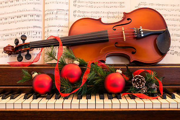 música festiva - musical instrument violin sheet music music fotografías e imágenes de stock