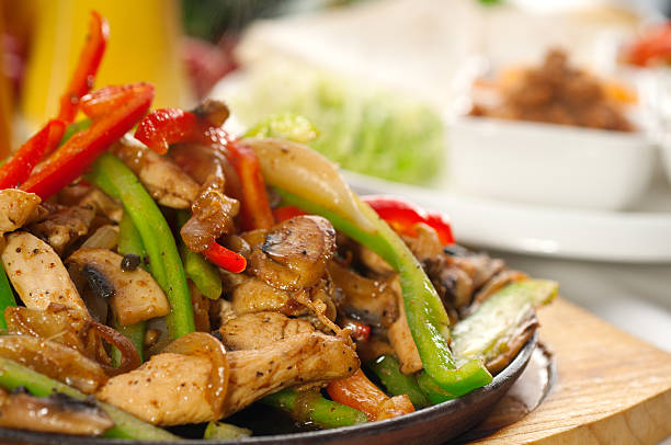 istock original fajita sizzling hot  on iron plate 157353401