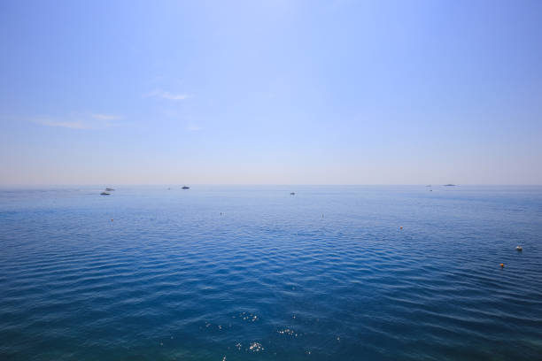 istock Calm sea with blue sea and sky 1573541144